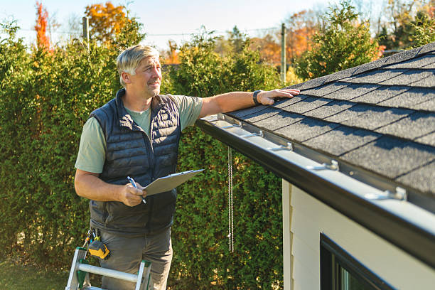 Professional Roofing technician working in Warner, NH